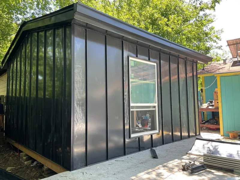 Black standing seam metal wall panels for Metal Roof Installation in North Syracuse