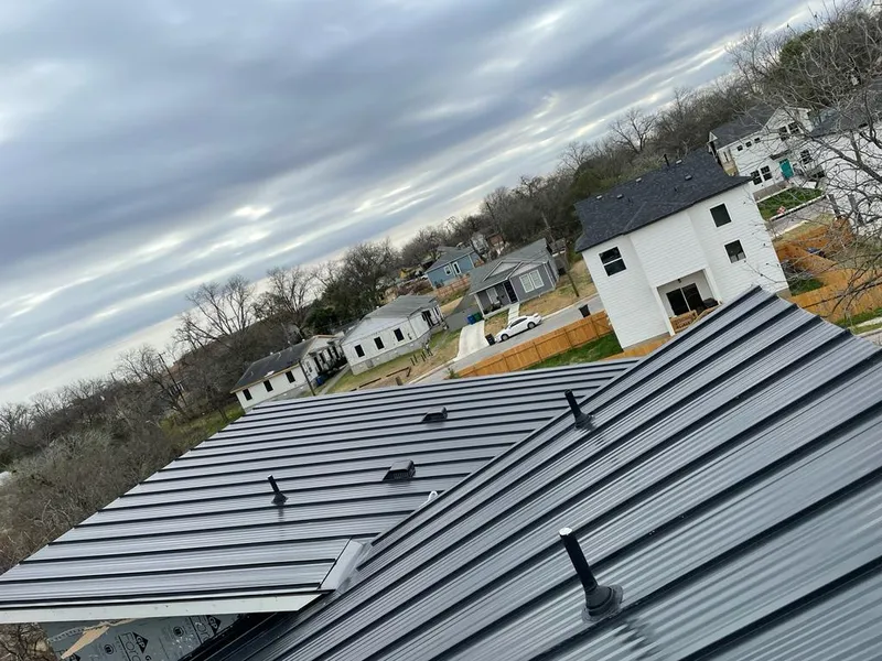 Standing seam metal roof panels with vents for Skylight Repair in North Syracuse